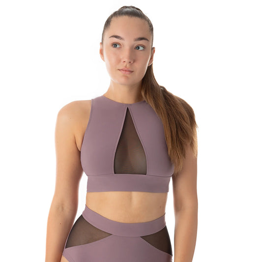 Femme portant une brassière couleur lilas pour la pole dance de marque dragonfly