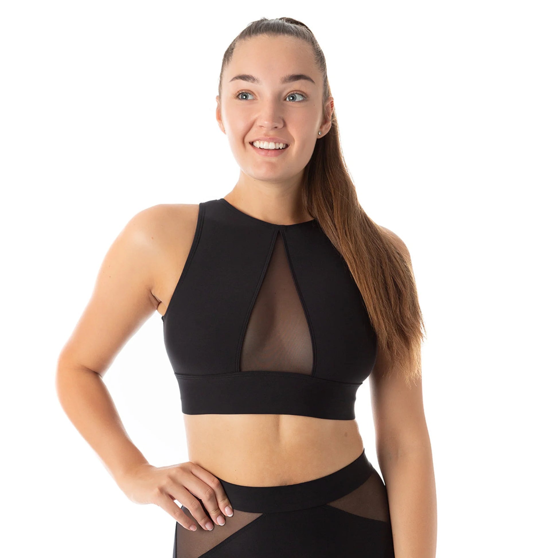 Femme portant une brassière couleur noire pour la pole dance de marque dragonfly