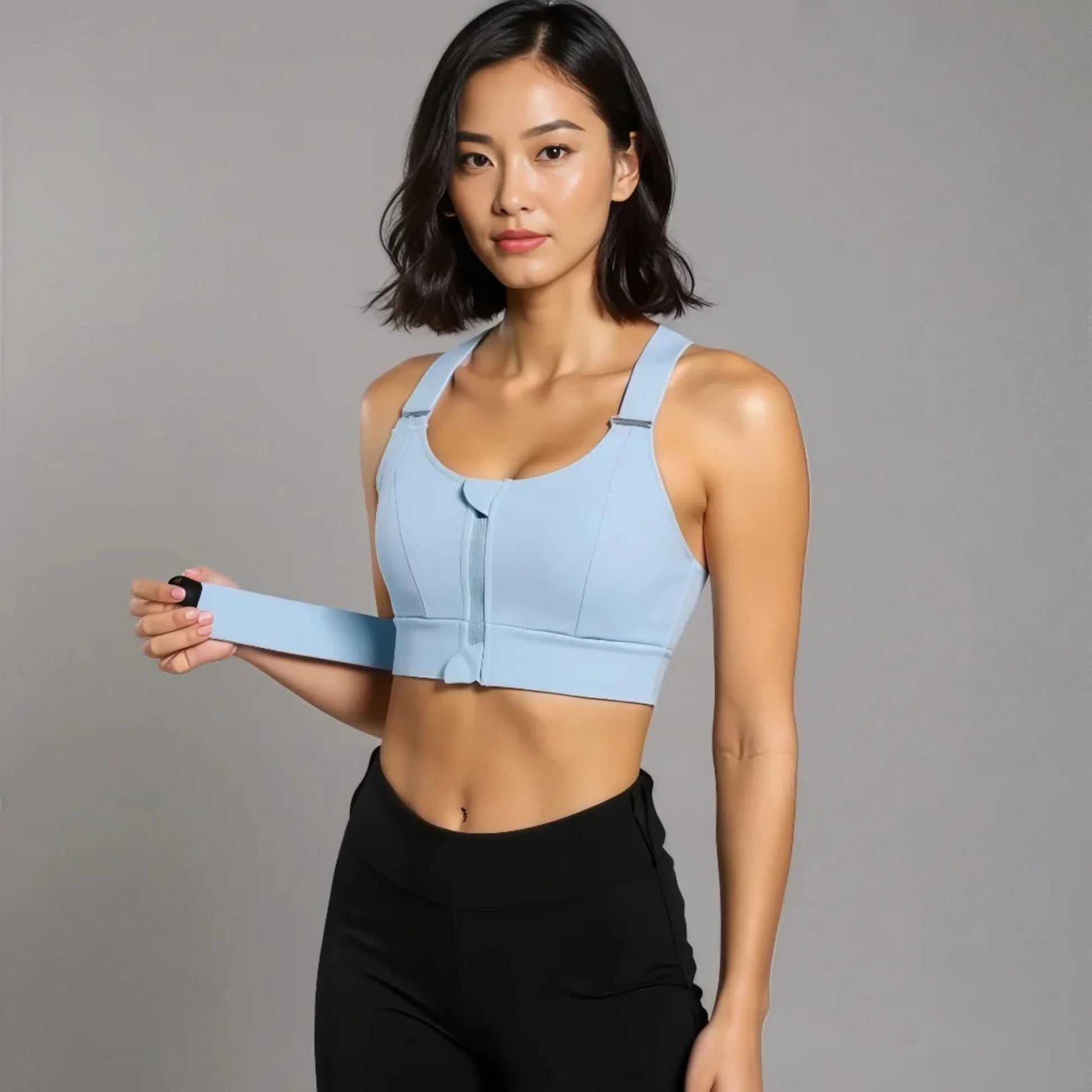 Femme portant une brassière de Pole Dance bleu
