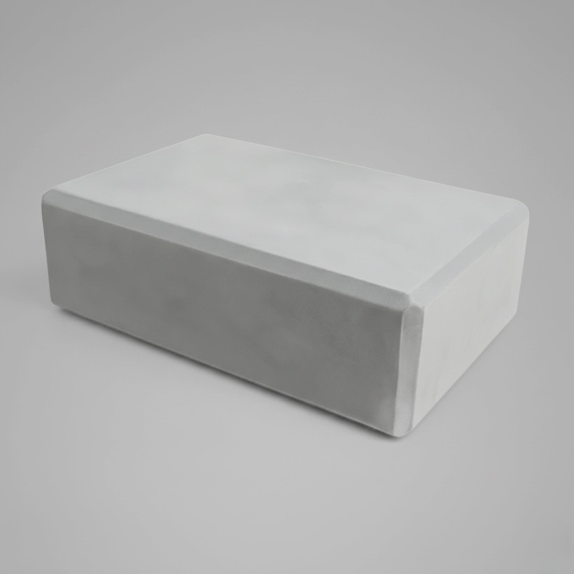 Brique/bloc de yoga de couleur gris