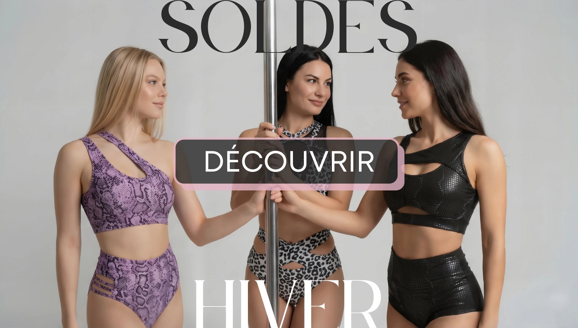 3 femmes en tenues de pole dance tenant une barre de pole dance