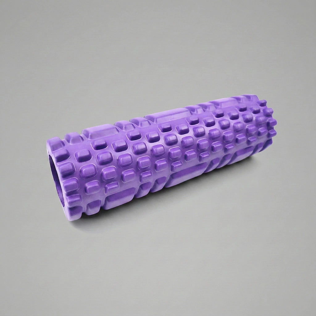 Rouleau de massage en mousse creuse de couleur violet